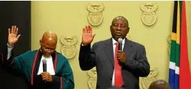  ?? —REUTERS ?? South Africa's President Cyril Ramaphosa is sworn in by Chief Justice Mogoeng Mogoeng in Cape Town on Feb. 15.