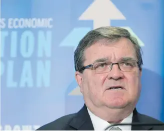  ?? Geoff Robins/the Canadian Press ?? Finance Minister Jim Flaherty says the federal government has plans to announce major new spending initiative­s or to make any significan­t cuts beyond what has already been announced.