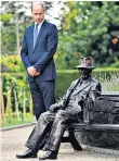  ??  ?? Pause for thought: the Duke of Cambridge beside the statue of Foley