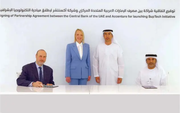  ?? ?? ↑
Top officials of both sides during the signing ceremony in Abu Dhabi.