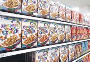  ?? ?? General Mills’ Cinnamon Toast Crunch 18.8-ounce boxes are on display on a supermarke­t shelf in Arlington, Virginia, U.S., Oct. 15, 2021.