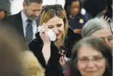  ?? Santiago Mejia / The Chronicle ?? Sarah Lockwood Barr, whose friend jumped to her death, cries during the Golden Gate Bridge barrier launch ceremony.