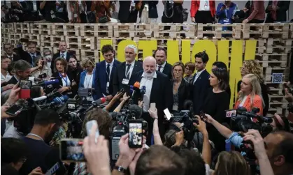  ?? Photograph: Sedat Suna/EPA ?? Members of the media listen as European Commission vice-president in charge of the European green deal, Frans Timmermans, speaks at Cop27.