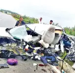  ??  ?? The mangled remains of the car that was involved in an accident in Tirupur on Monday