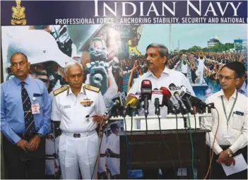  ?? PHOTOGRAPH: Indian Navy ?? Defence Minister Manohar Parrikar addressing the Commanders during the inaugural session. Also seen in the photograph is the Chief of the Naval Staff Admiral Sunil Lanba.