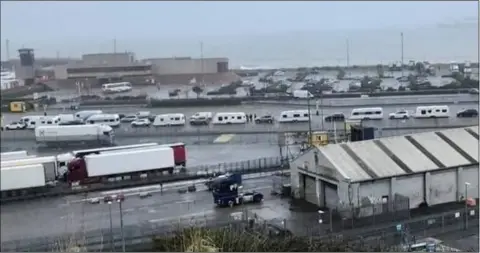  ??  ?? A convoy of caravans lined up to board a ferry at Rosslare Europort recently.