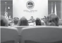  ?? JOE RAEDLE/GETTY ?? The town hall meeting at Coral Springs City Hall on Wednesday came in response to the loss of two Marjory Stoneman Douglas High School teenagers from suicide. It was intended to provide informatio­n and resources about mental health to the community.