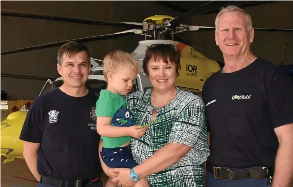  ?? Photo: Alexia Austin ?? MAGIC MOMENT: Meeting at the RACQ LifeFlight Toowoomba hangar yesterday were (from left) SGAS LifeFlight paramedic Stephen Baigrie, Matthew Blauw, Kate Blauw and LifeFlight pilot David Hampshire.