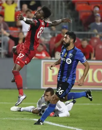  ?? STEVE RUSSELL/TORONTO STAR FILE PHOTO ?? TFC’s Tosaint Ricketts figures last year’s close call against ‘keeper Evan Bush and the Impact will help Reds focus.