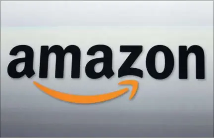  ?? REED SAXON — THE ASSOCIATED PRESS FILE ?? Online leader Amazon Inc. has refused comment on reports that it plans to split its new headquarte­rs between two locations. The Wall Street Journal and New York Times reported late Monday that the company would locate the new facilities in Queens in New York City and in the Crystal City area of Arlington, Virginia.