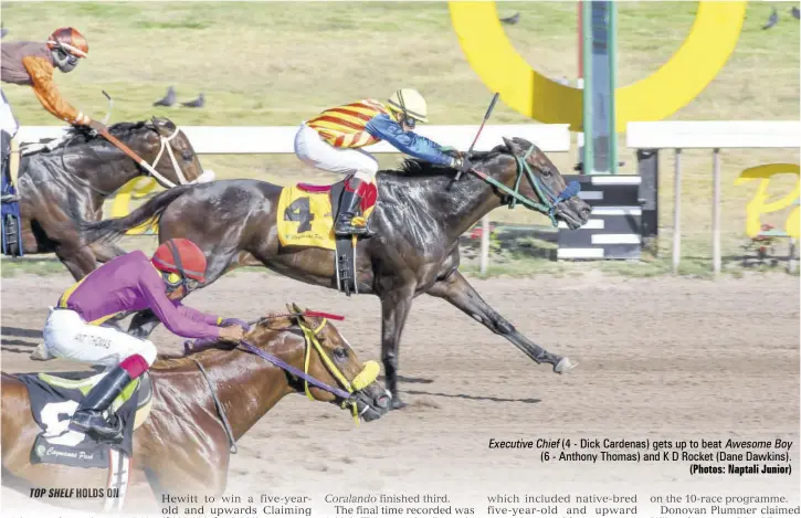  ?? (Photos: Naptali Junior) ?? Executive Chief (4 - Dick Cardenas) gets up to beat Awesome Boy (6 - Anthony Thomas) and K D Rocket (Dane Dawkins).