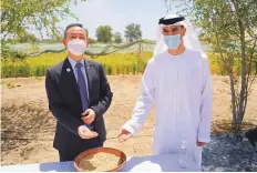  ??  ?? Dr Thani Bin Ahmad Al Zeyoudi with Kwon Yongwoo during a visit to the ministry’s research centre in Al Dhaid, Sharjah.