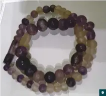  ??  ?? 9) Amethyst and rock crystal round bead necklace from around 1500 BC.