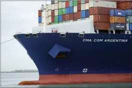  ?? LYNNE SLADKY — THE ASSOCIATED PRESS ?? Crew members stand on the bow as the CMA CGM Argentina, the largest container ship to call at a Florida port, arrives at PortMiami on Tuesday.