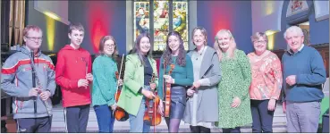  ?? ?? Members of Comhaltas Ceoltóirí Éireann, Baile Mhistéala, who performed at the Saint Patrick’s Day concert at Saint George’s. L-r: Odhran Brennan, Colm King, Anne-Marie King, Niamh and Órna Joy, Lil de Róiste, Kayren Ní Aodha, Eilís Watson and Liam de Róiste.