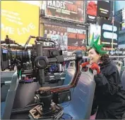  ?? Elizabeth Fisher CBS ?? ACTOR Carrie Preston rides through New York’s Times Square while filming “Elsbeth” for CBS.