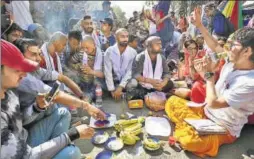  ?? RAJ K RAJ/HT ?? Students get their head tonsured to protest against the leak of question paper of the Combined Graduate Level exam conducted by the Staff Selection Commission (SSC), in New Delhi on Sunday. Aspirants have been demanding a written submission from the...