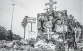  ?? Mark Mulligan / Staff file photo ?? A tribute to Nicolas Chavez, 27, killed last April 21, sits at the site along Interstate 10 five months later.