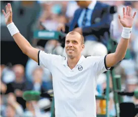  ??  ?? Gilles Muller festeja su pase a los cuartos de final