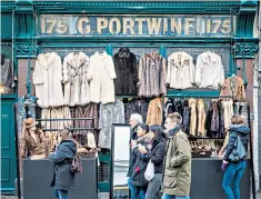  ??  ?? Soft bargain: vintage furs for sale at Portobello Market in Notting Hill, west London