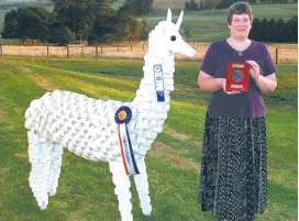  ??  ?? First prize for a first sculpture attempt. Dianne Jackson of Drouin won best craft exhibit at the Berwick Show for her PVC pipe alpaca sculpture.