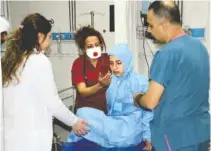  ?? THE ASSOCIATED PRESS ?? Turkish medics check a victim of alleged chemical weapons attacks. The attacks in Syria’s rebel-held northern Idlib province killed dozens of people and was among the worst in the country’s six-year civil war, opposition activists said.
