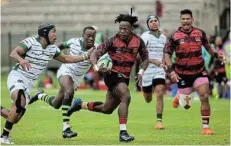  ?? Picture: WERNER HILLS ?? DASHING THROUGH: EP Elephants wing Rodney Damons goes on the attack for his team during their SA Cup match against the SWD Eagles at the Wolfson Stadium in Kwazakhele