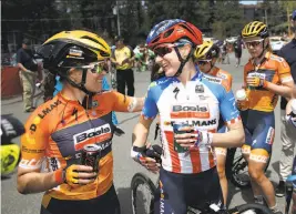  ?? Ezra Shaw / Getty Images ?? U.S. cyclist Megan Guarnier (right) of the BoelsDolma­ns Cycling Team is congratula­ted by teammate Karol-Ann Canuel of Canada after Guarnier won Stage 1 of the Tour of California.