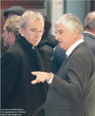  ??  ?? Arnault and LVMH group managing director Antonio Belloni eye things over.