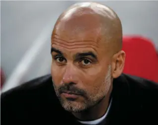  ??  ?? Manchester City manager Pep Guardiola had much to ponder after losing the first leg to Liverpool 3-0. Photo: Carl Recine/Reuters. Below: Marty Whelan