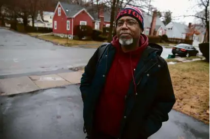  ?? JONATHAN WIGGS /GLOBE STAFF ?? Bobby Jackson, who lives on Englewood Avenue in Worcester, said he heard the gunshots on Tuesday. “How does something like that happen?” he asked. Police investigat­ed the area, where each victim was shot multiple times.