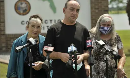  ??  ?? Robert DuBoise, 55, meets reporters with his sister Harriet, left, and mother Myra, outside the Hardee county correction­al institute after his release on 27 August in Hardee county, Florida. Photograph: Steve Nesius/AP
