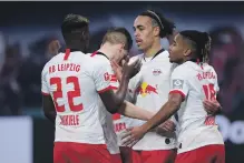  ?? AFP ?? RB Leipzig hold a two-point lead at the halfway stage