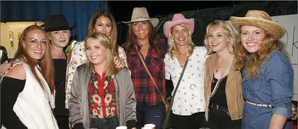  ??  ?? Enniscorth­y Hockey team members and friends pictured recently enjoying a night out at the Bree Barndance.
