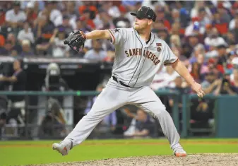  ?? Gregory Shamus / Getty Images ?? Giants closer Will Smith was perfect in save opportunit­ies this season, going 23for23, until failing to hold a lead Friday night. The lefthander is one of the Giants’ prime trade chips.