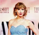  ?? MATT WINKELMEYE­R/ GETTY IMAGES/ TNS ?? Taylor Swift attends “Taylor Swift: The Eras Tour” concert movie world premiere at AMC
The Grove 14 on Oct.
11, in Los Angeles.