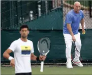  ?? Picture: REUTERS ?? LET’S PLAY DOUBLES: Novak Djokovic and coach Andre Agassi during training in London.