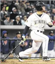  ?? SEAN RAYFORD / ASSOCIATED PRESS ?? Tim Tebow watches his home run in his first at-bat on opening day Thursday in a Columbia Fireflies minor league game against Augusta.