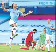  ?? AP ?? ■
Manchester City's Raheem Sterling celebrates scoring their second goal at Etihad Stadium on Thursday.