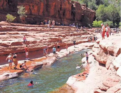  ?? PHOTOS BY ROGER NAYLOR ?? Famed swimming hole, Slide Rock State Park, is one of the iconic stops along 89A in Oak Creek Canyon.