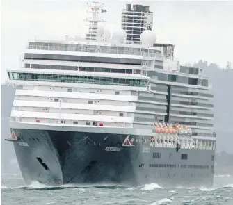  ??  ?? The Holland America Line cruise ship MS Westerdam approaches Ogden Point during a second bid to dock amid high winds on Wednesday. It succeeded on its third try.