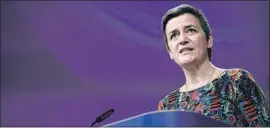  ?? John Thys AFP/Getty Images ?? MARGRETHE VESTAGER, the EU’s aggressive chief antitrust regulator, discusses the Google fine at a news conference in Brussels on Wednesday.