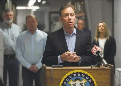  ?? Brian A. Pounds / Hearst Connecticu­t Media ?? Gov. Ned Lamont addresses the media at medical equipment manufactur­er Bio-Med Devices in Guilford on Mar. 29.