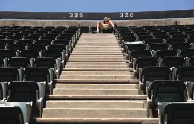  ??  ?? Santiago Musgrove of Los Gatos relaxes in the kind of seats in the upper deck that Bob Uecker made famous.