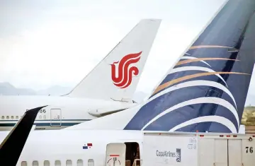  ??  ?? File photo shows the tail of the Air China Boeing 777-300ER plane, which flew Air China’s inaugural flight from Beijing to Panama City via Houston, is pictured after it landed at the Tocumen Internatio­nal airport in Panama City, Panama. — Reuters photo