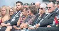  ?? JUSTIN TANG THE CANADIAN PRESS ?? Under overcast skies on Saturday, families and comrades paid tribute to the Canadians who died in the war in Afghanista­n.