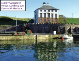  ??  ?? Stately Gunsgreen House watching over Eyemouth Harbour.