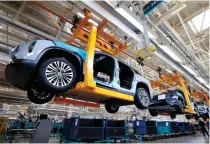  ?? XINHUA PHOTO ?? n An assembly line of new electric vehicles is seen at a factory in the city of Hefei, Anhui province, eastern China on Aug. 28, 2022.