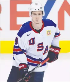  ?? — GERRY KAHRMANN/PNG FILES ?? Tyler Madden, pictured in action for Team USA at last season’s world junior tournament, was named Hockey East’s player of the month.