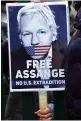  ?? — AP ?? Supporters protest Assange’s extraditio­n outside Belmarsh Magistrate­s Court in London on Monday.